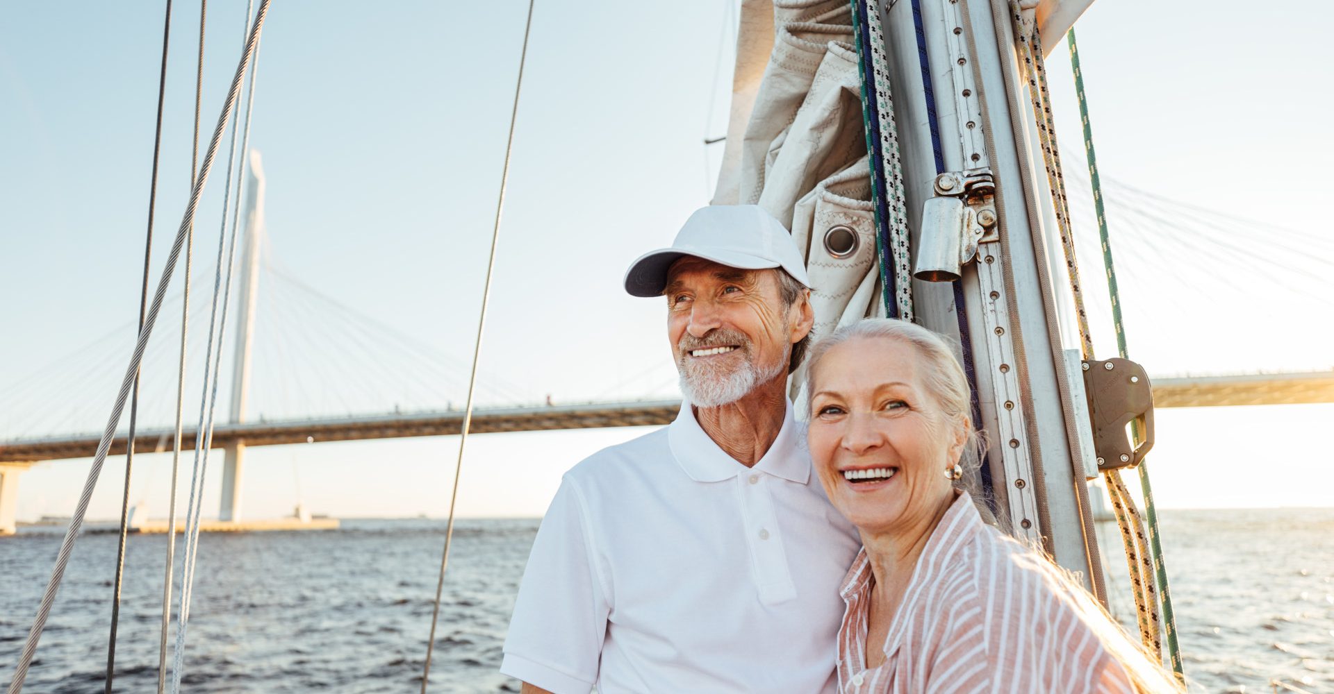 happy retired couple enjoying traveling from credit investing returns